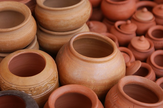 A bunch of ceramic pots. Image by johannatherealtor on Pixabay.